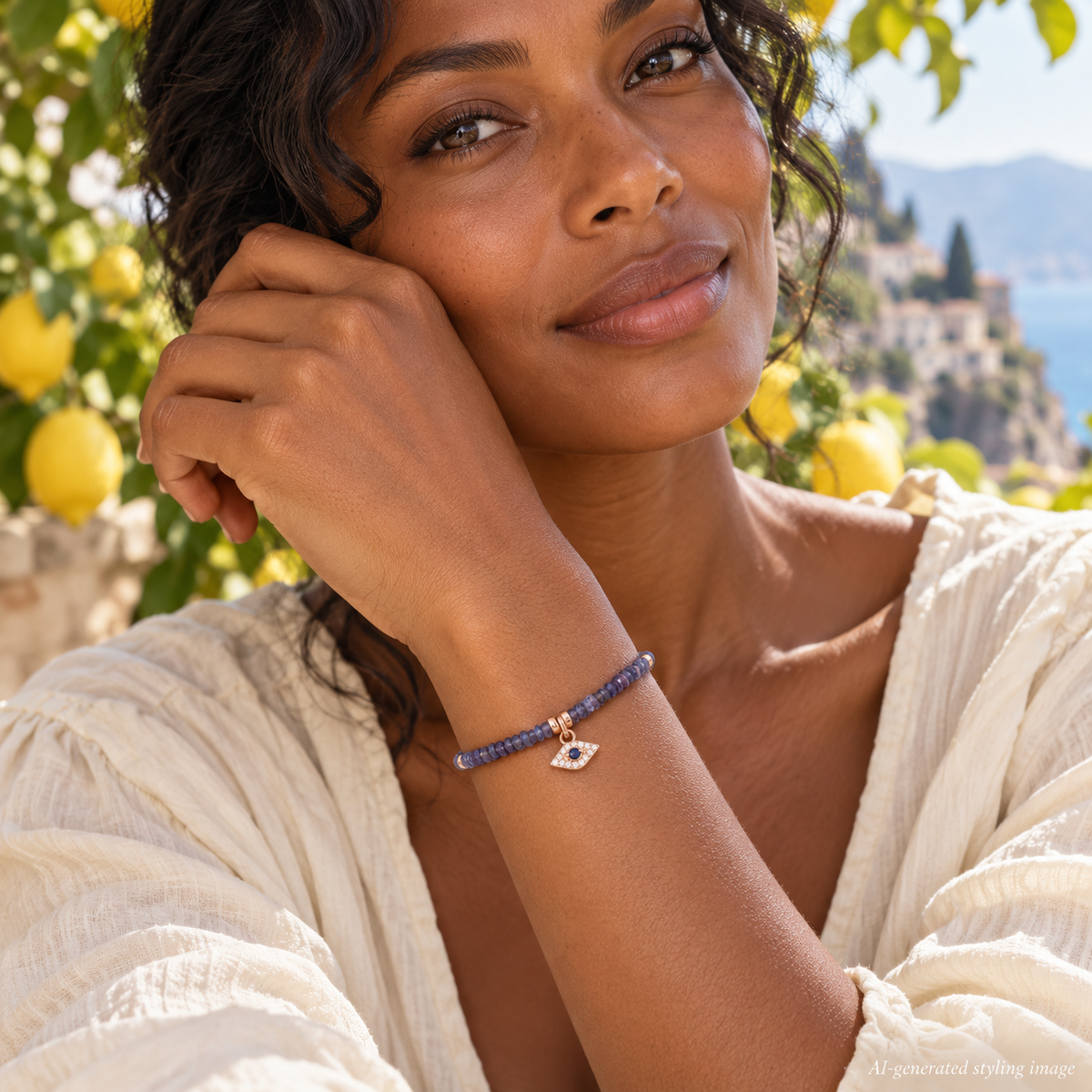 AI-generated styling image: LTDE24 Nº 012 — Awaken | Purple Sapphire Evil Eye · Beaded Bracelet worn on a model in a Mediterranean setting.
