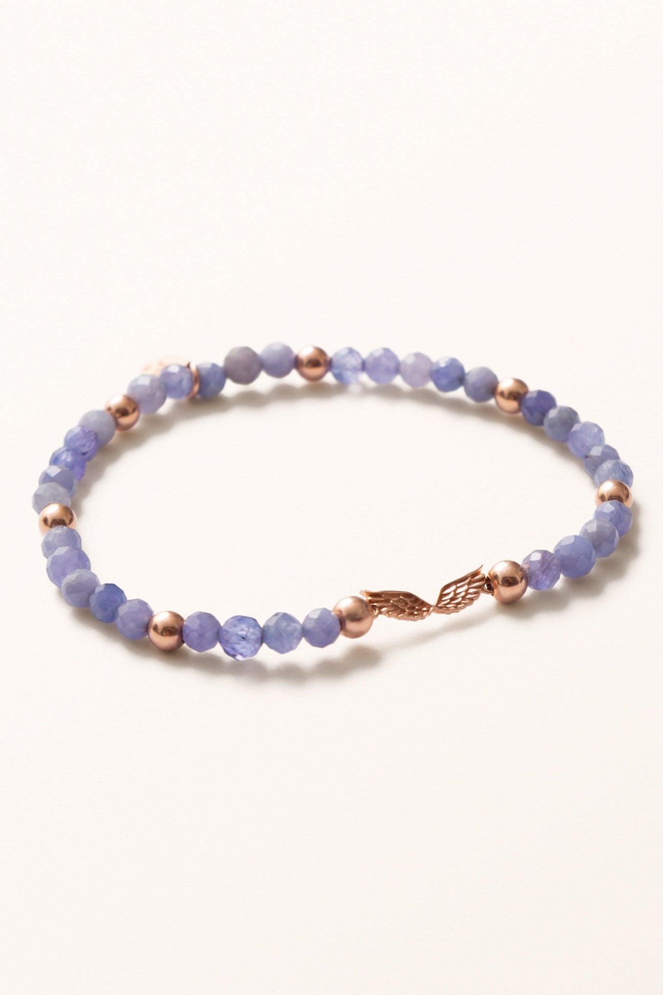 Soul Purpose Beaded Bracelet | Solid Gold Angel Wings on Tanzanite - Melana | Jewels for the Journey