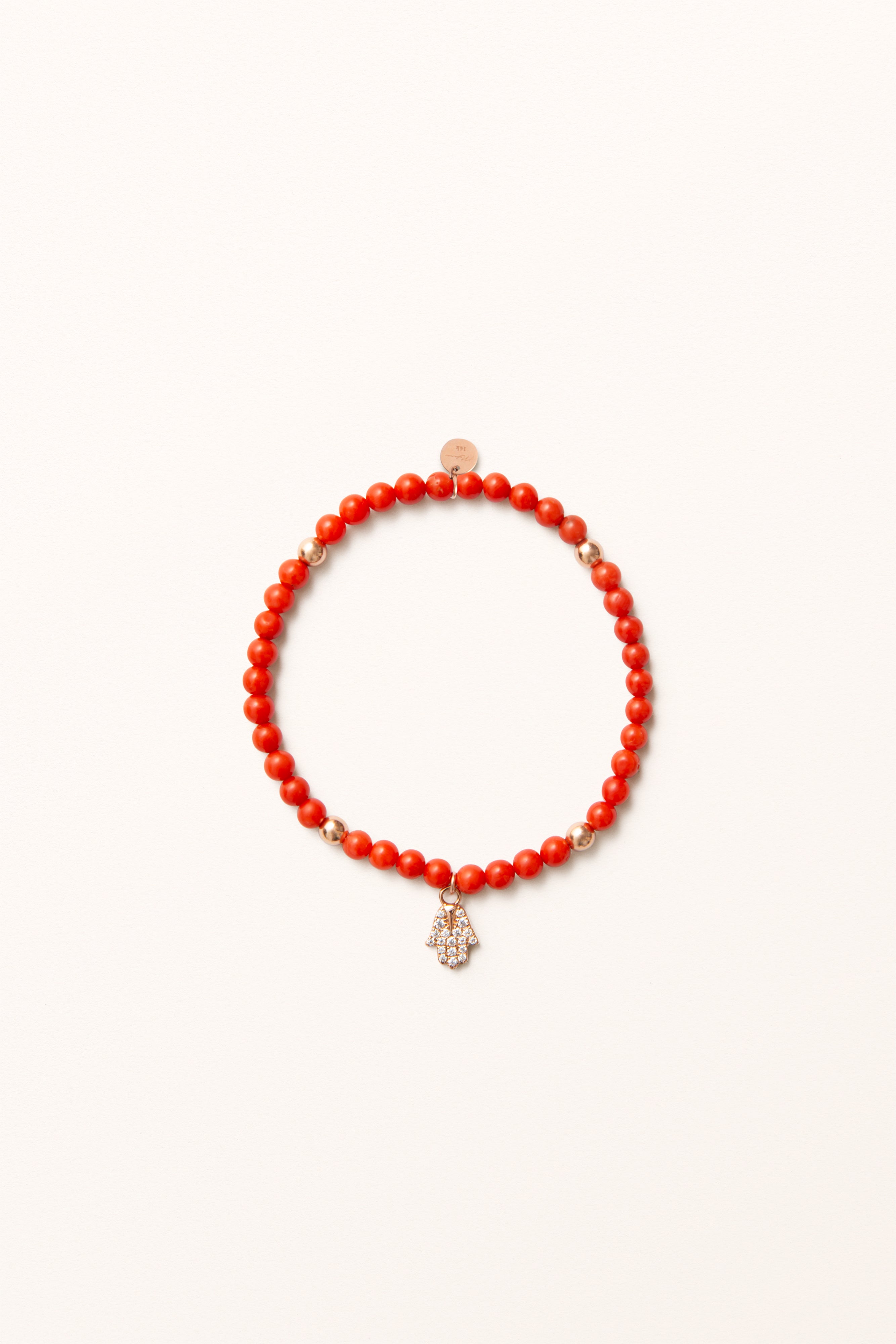 Delicate beaded bracelet with warm earth tones.