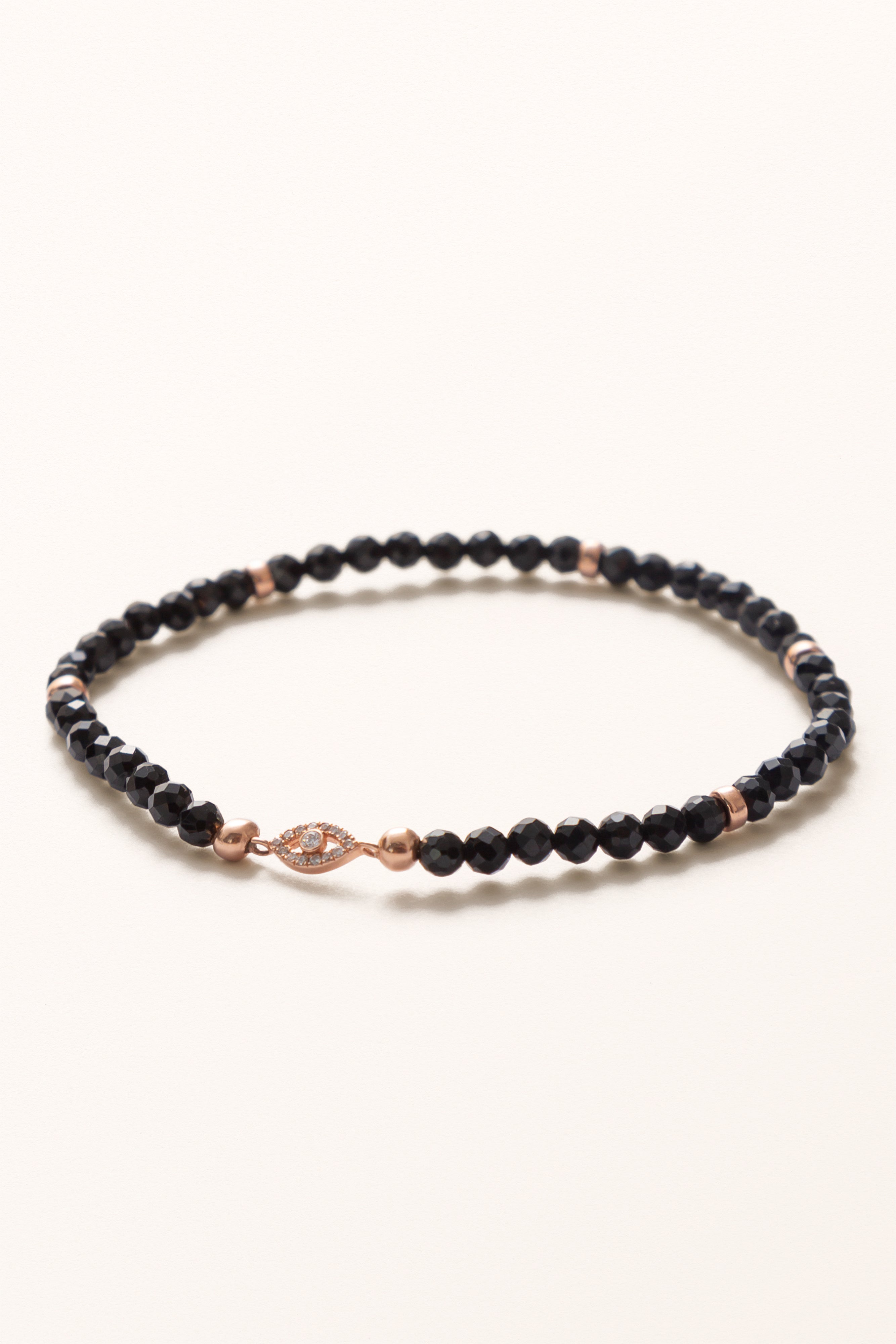 Handmade beaded bracelet with warm, natural hues.