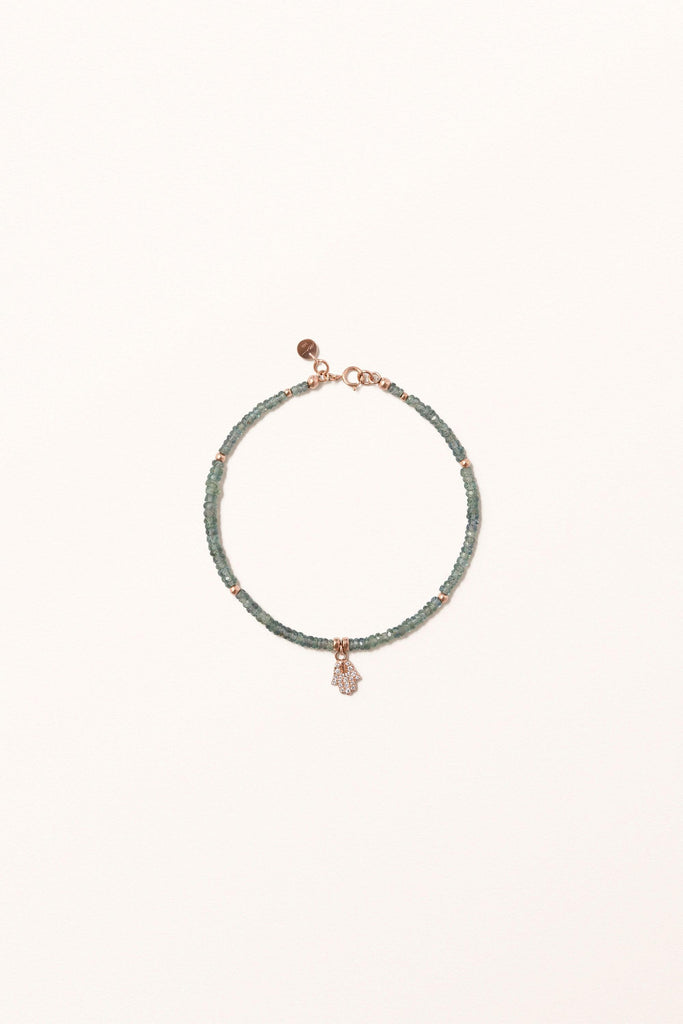 Shared Dreams | Solid Gold Diamond Hamsa on Green Sapphires - Melana | Jewels for the Journey