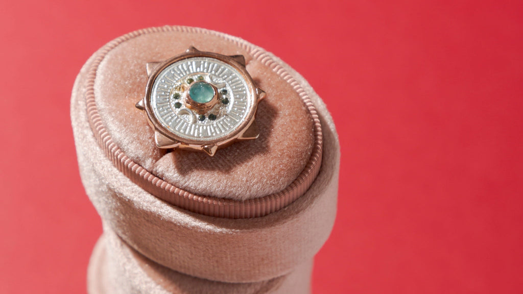 Jewelry crafting process highlighting attention to detail.