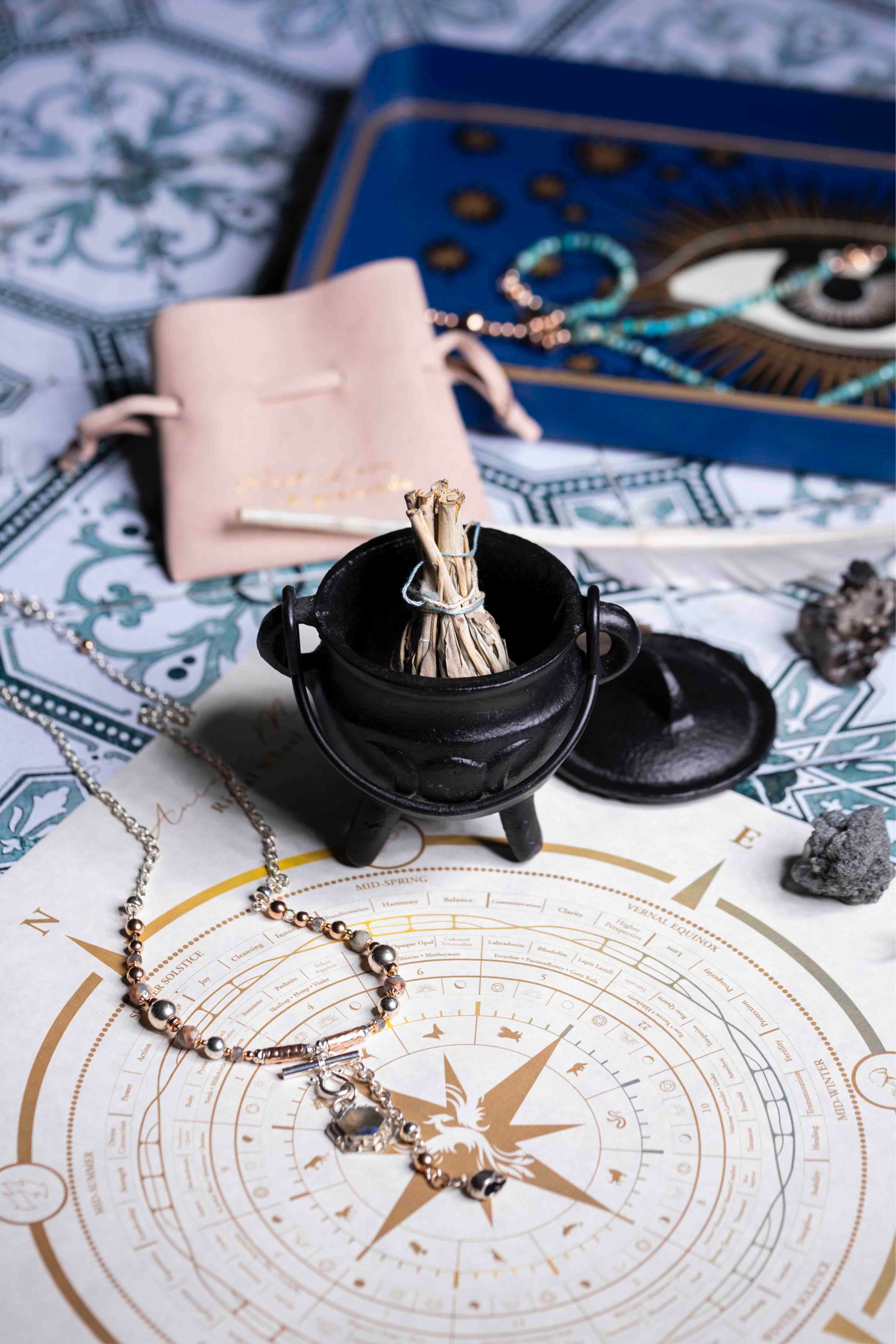 Model styling Melana bangles and necklaces with elegant outfit