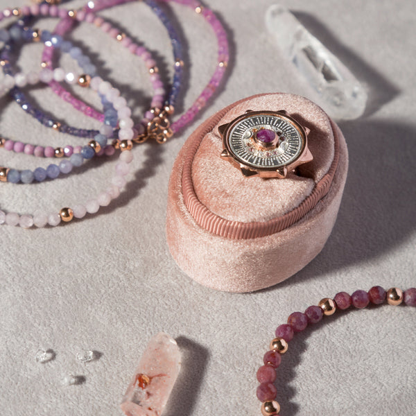 Intricately crafted jewelry piece reflecting Melana’s artistic essence.